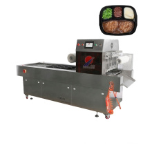 Automatic continuous vacuum map tray sealer